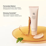 a bottle of cream and a root on a plate