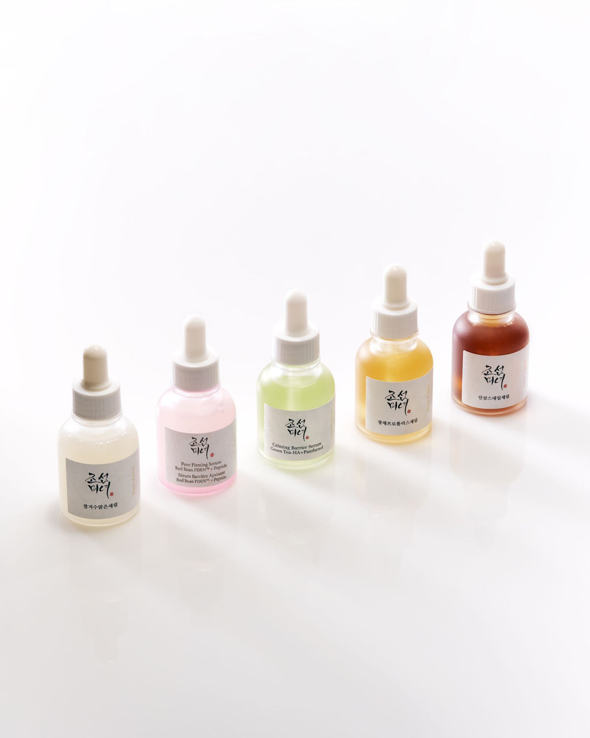 a group of bottles of liquid